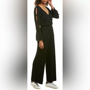 BB Dakota Black Jumpsuit Size MT Peek-a- boo sleeves that tie, bell style cuffs